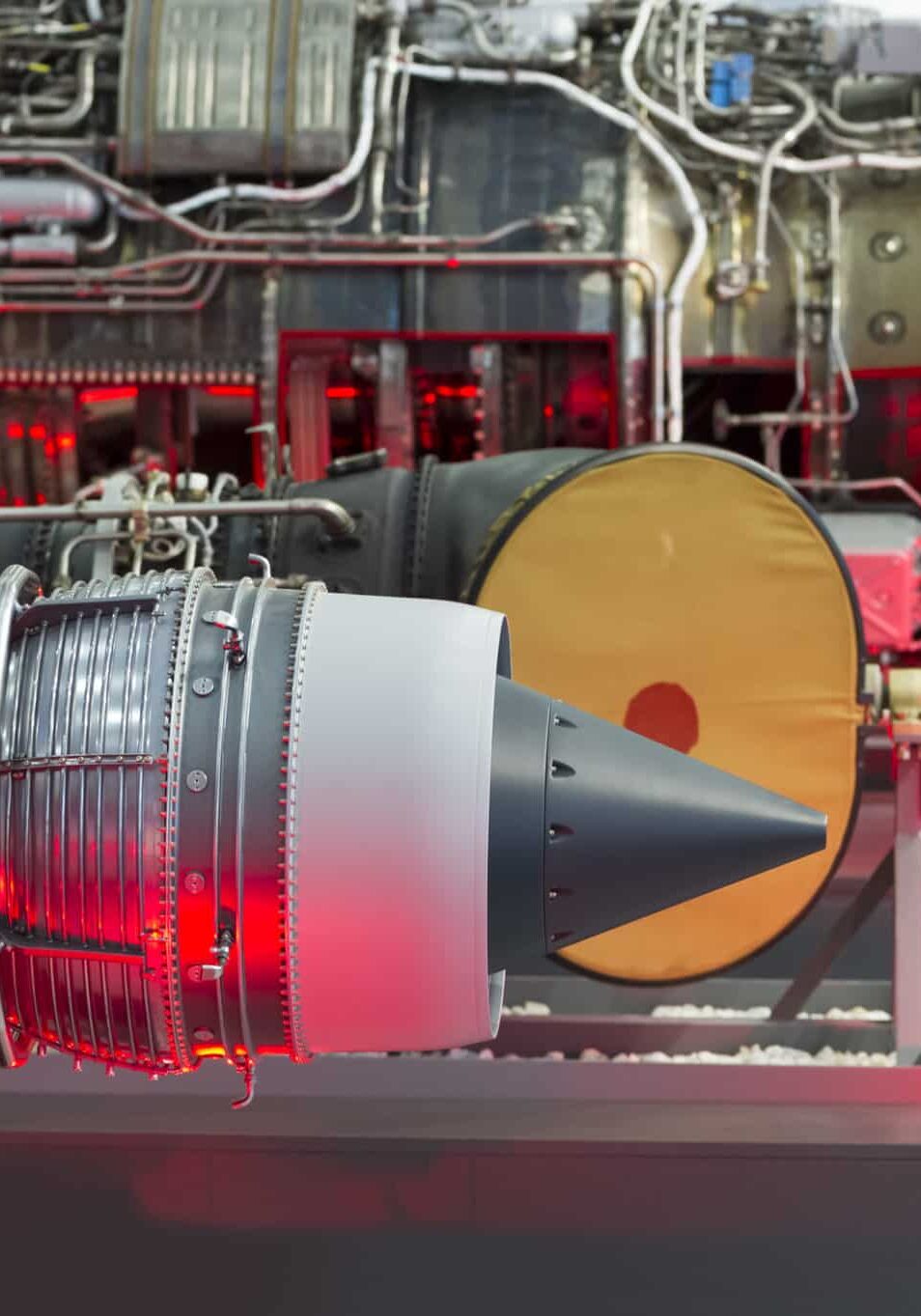Fighter jet and helicopter engines in row, internal structure with hydraulic, fuel pipes and other hardware and equipment, army aviation, military aircraft and aerospace industry