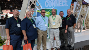 A group photo of Richards' staff attending the IMTS Show