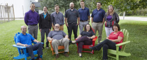 A picture of the Richards Ind Sales Team. They are smiling and sitting outside